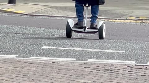 Man Spots Warwick Davis Riding a Self-Balancing Scooter