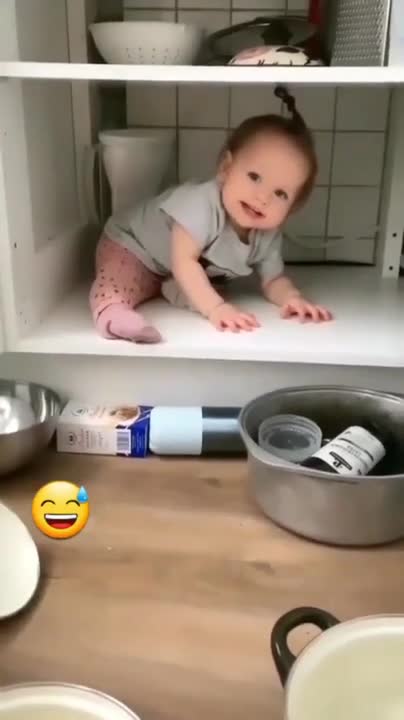 Twin baby girls fight over pacifier