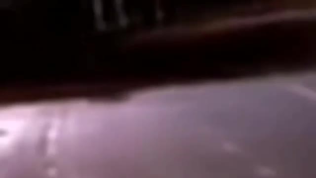 Alien Appears In The Middle Of The Road