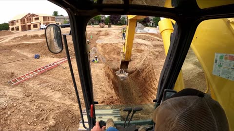 Starting a new ditch out of a manhole.