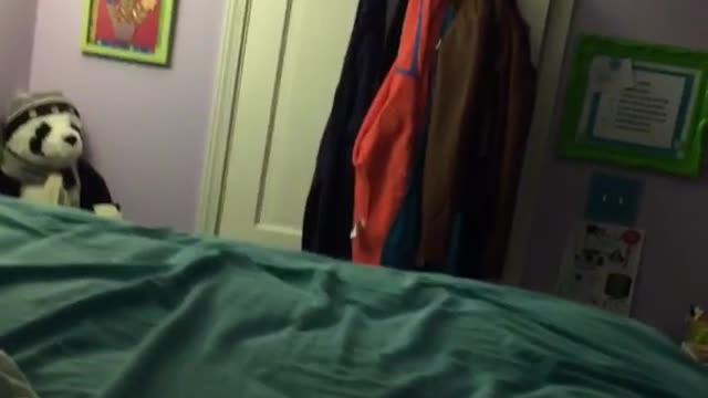Girl pushes guys feet off bed and he falls off