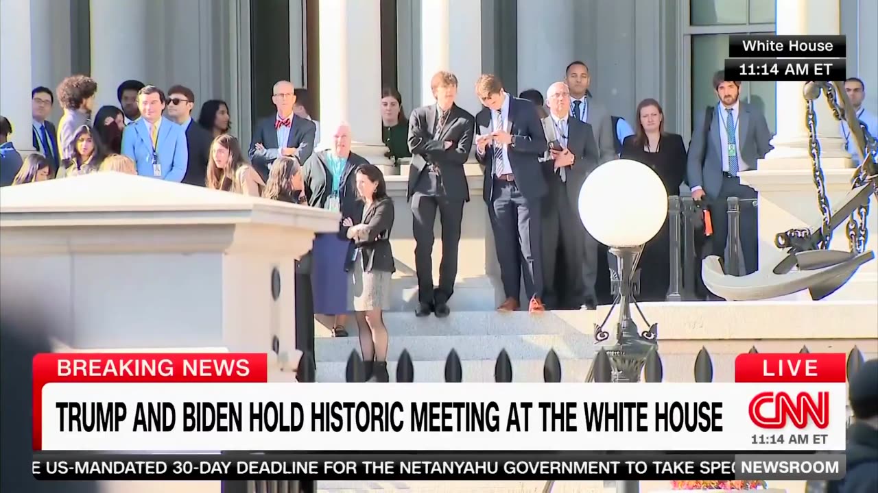 Biden-Harris staffers came out of their offices to catch a glimpse of Trump during his return