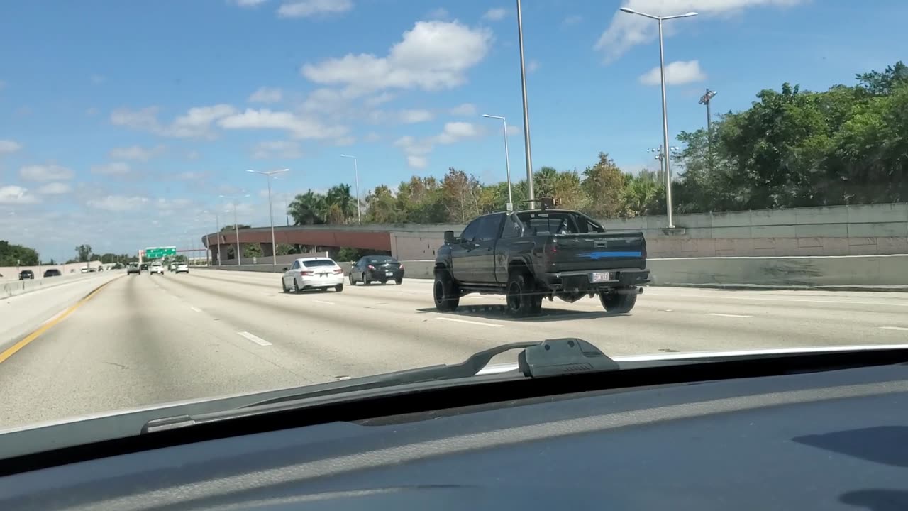 A machine gun on top of a pickup truck. hahahaha