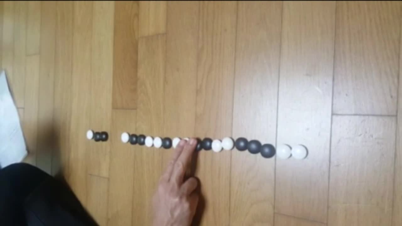 Move 10 go stones 10 times to make black and white.