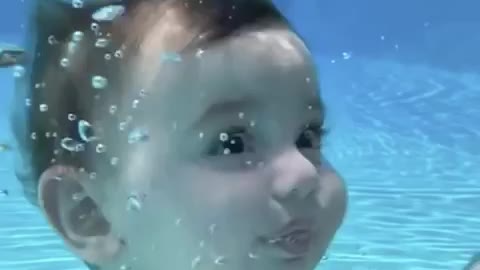 2 month age Baby swimming