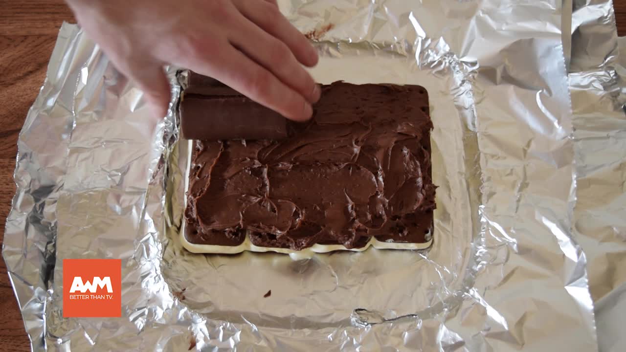 He starts by laying ice cream sandwiches on a tray. What he ends up making? INCREDIBLE!