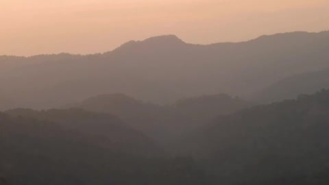 View to the horizon of a mountain range in a beautiful sunset