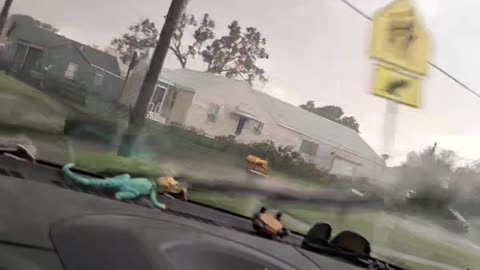 Strong Winds Blow Debris Across Road in Kansas