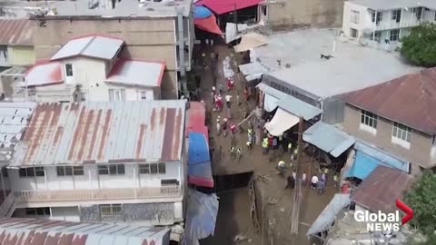 Iranian president surveys damage from deadly floods, landslides