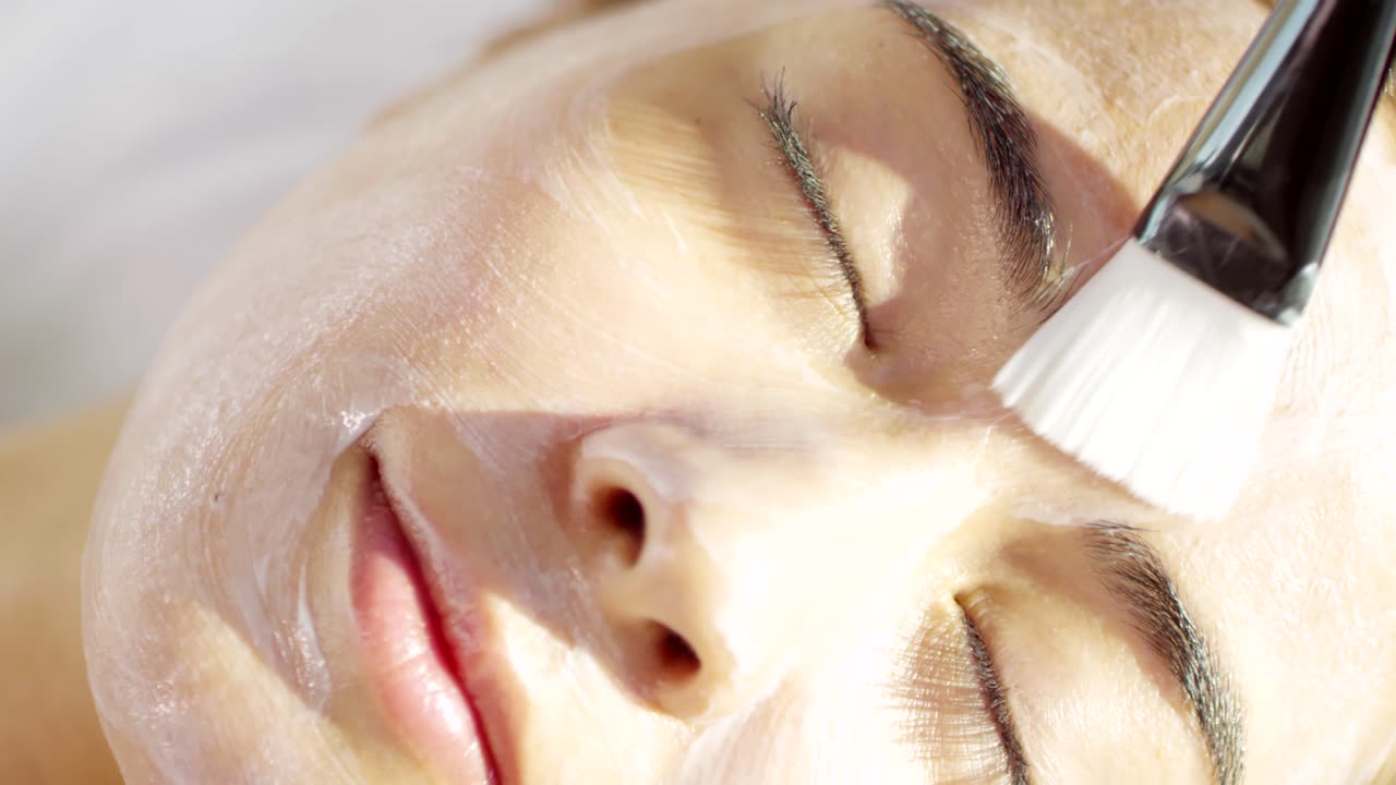 A Woman Face Having A Facial Treatment-A Woman's Journey through a Luxurious Facial Treatment