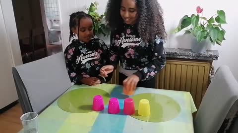 Children plays with the cup. Try this