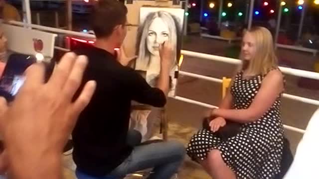 The guy draws the girl