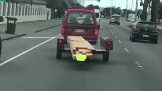 Overloaded Van Trailer Has Some Trouble