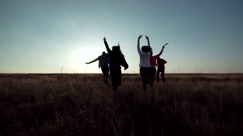 Friends running in the countryside