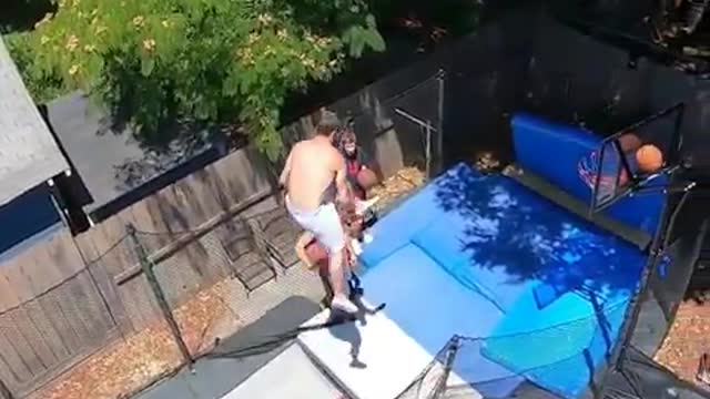 Dude pulls off epic basketball trampoline trick shot