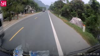 Two Trucks Avoid Clueless Pedestrian