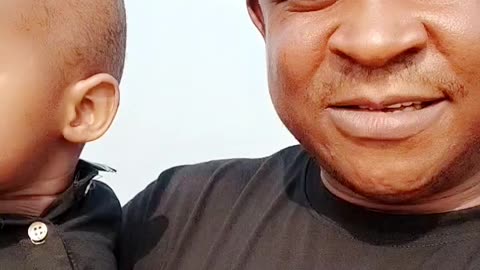 Father and son having a nice time