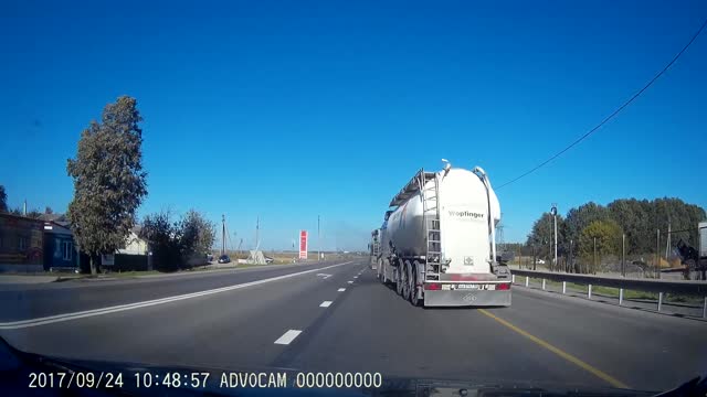 Truck Crashes into Passing Car