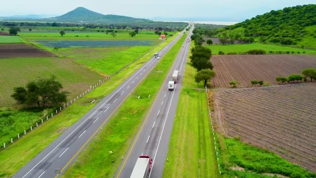 Aerial view of a road that crosses through nature