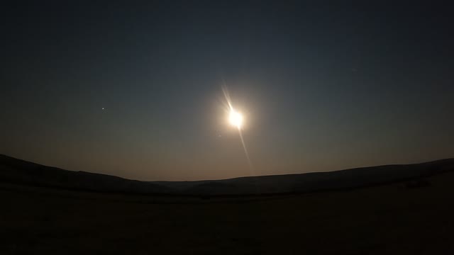 Nightlapse of the moon in Dartmoor.