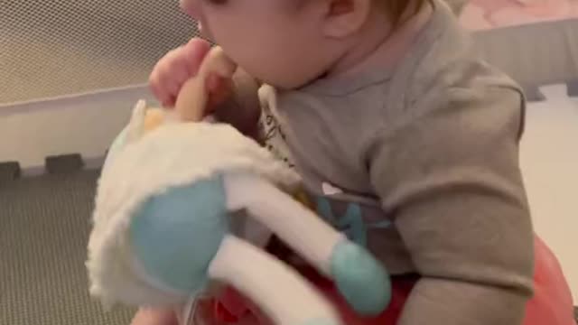 Cute baby playing