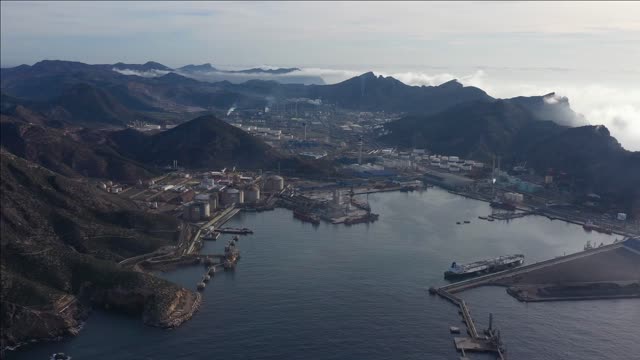 aerial view of an industrial plant between mountains carthagena spain