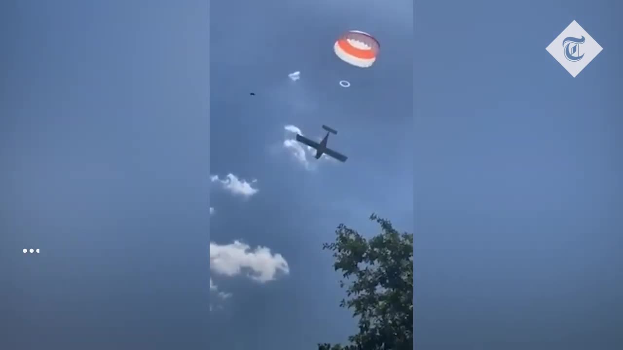 Pilot deploys parachute to slow the descent of his light aircraft as it crashes