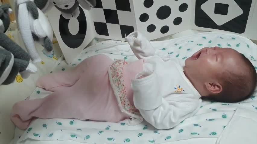 My 2-month-old baby is cute even when she cries.