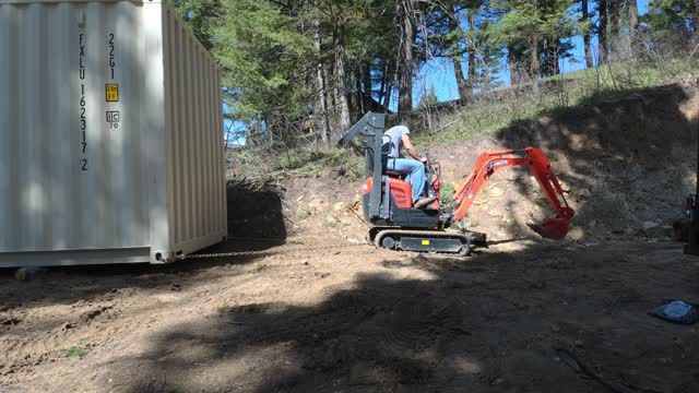 Mini Excavator Moving Shipping Container