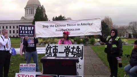 Jane Maer at the Stand up before you kneel, stop the lock down protest