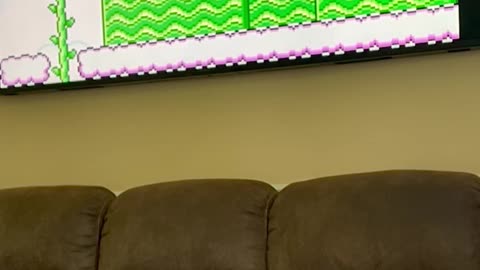 #Mario Running Delta iOS Emulator, with Bluetooth controller Airplay