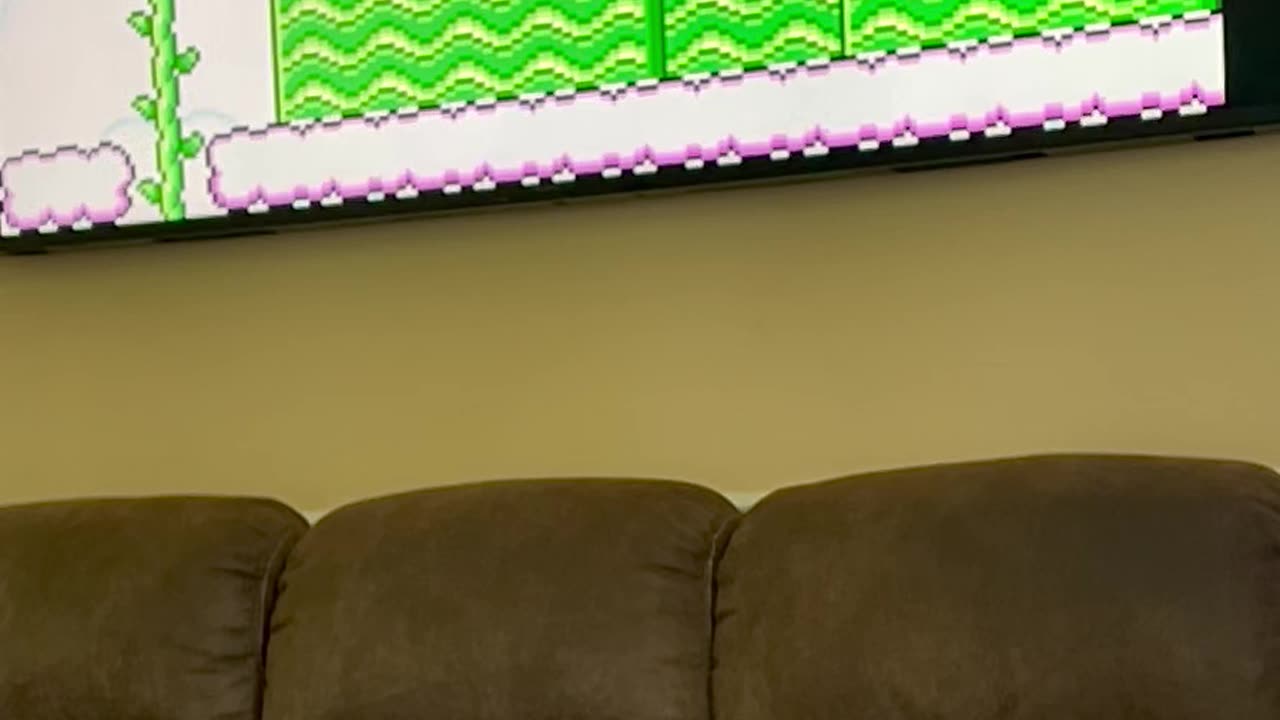 #Mario Running Delta iOS Emulator, with Bluetooth controller Airplay