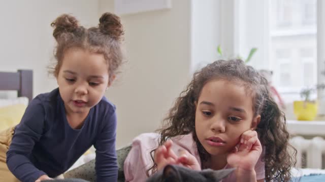 Kids Petting Their Cat On The Bed؛؛؛