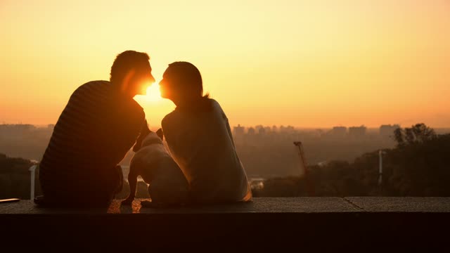 couple with dog