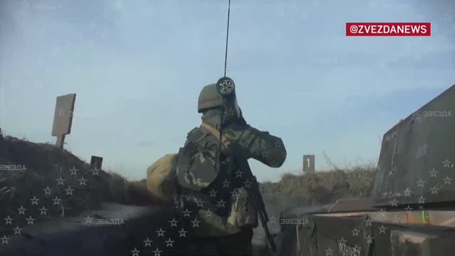 Anti-aircraft gunners of the 155th Marine Brigade, Pacific Fleet, cover their charges