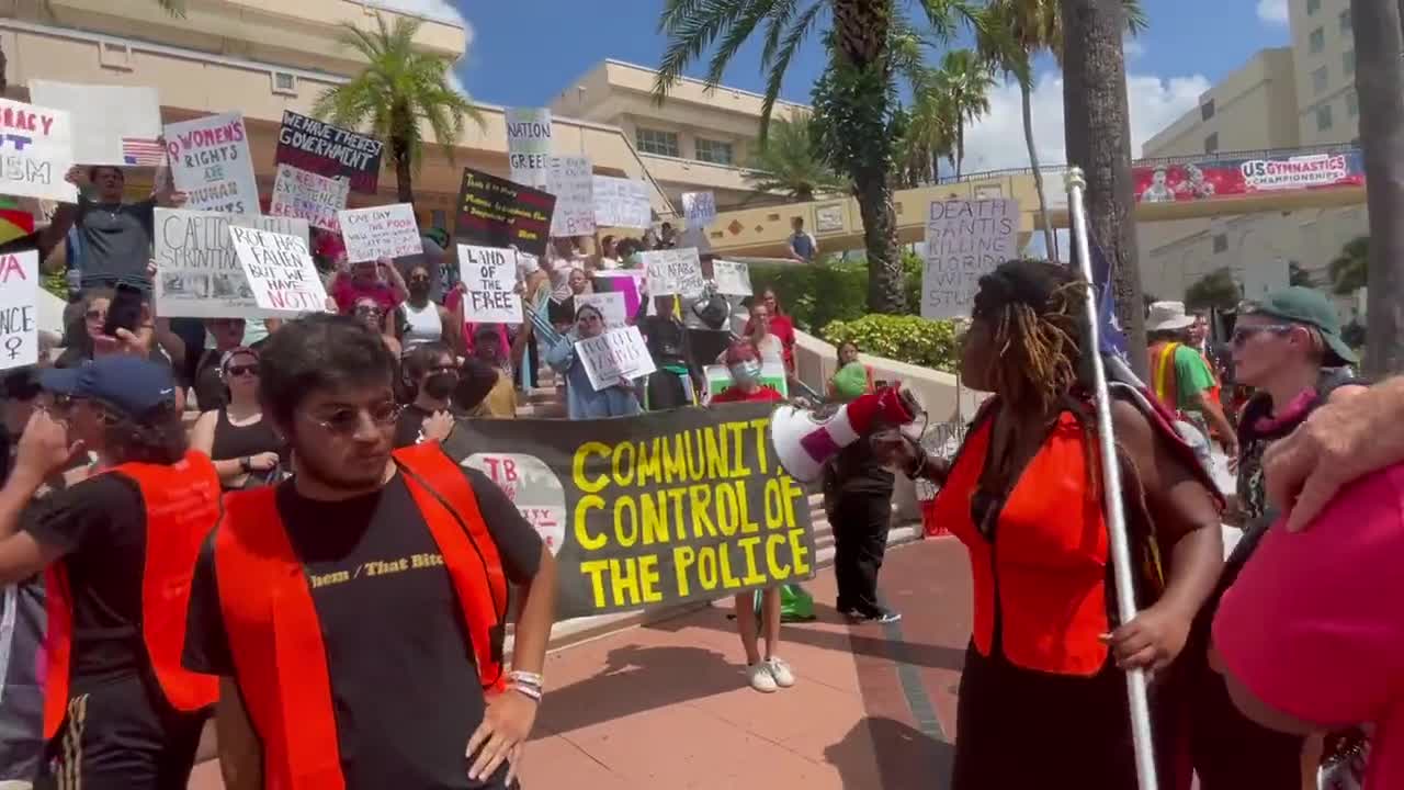 Protesters have gathered outside the Tampa Convention Center to protest TPUSA’s