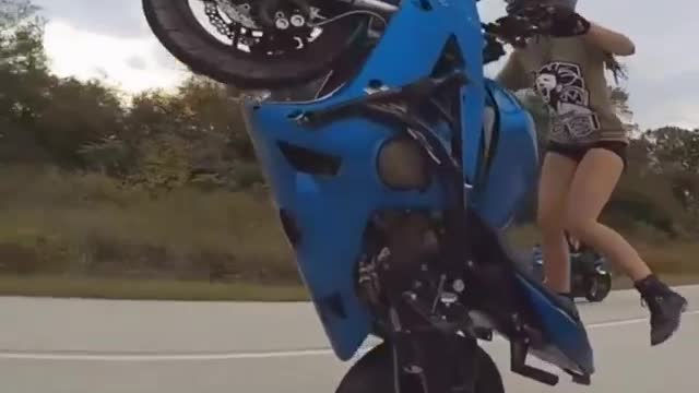 Beautiful Girl Biker Performs AMAZING Highway Motorcycle Stunts Riding Long Stunt Bike Wheelies