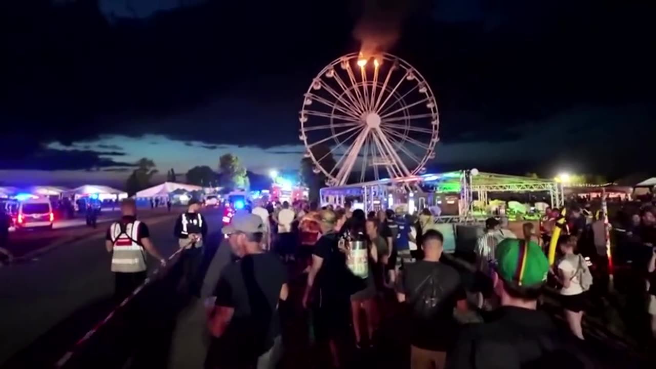 Ferris wheel catches fire at German music festival.mp4