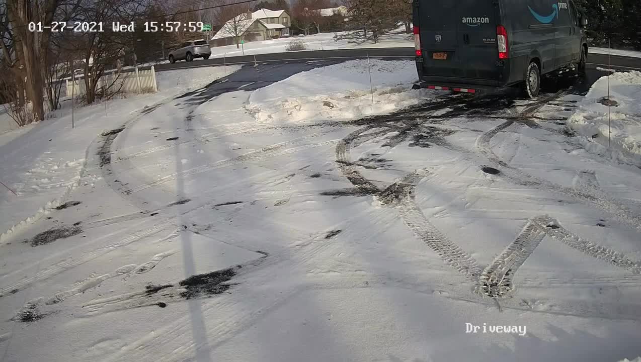 Amazon Driver Gets Van Stuck in Front Yard and Ruins Lawn