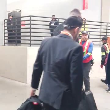 Pfizer spokesman & Taylor Swift's BF shows up to Super Bowl in a Weird Suit