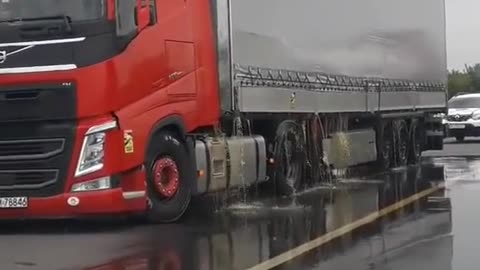 There was a leak in the big truck on the highway.