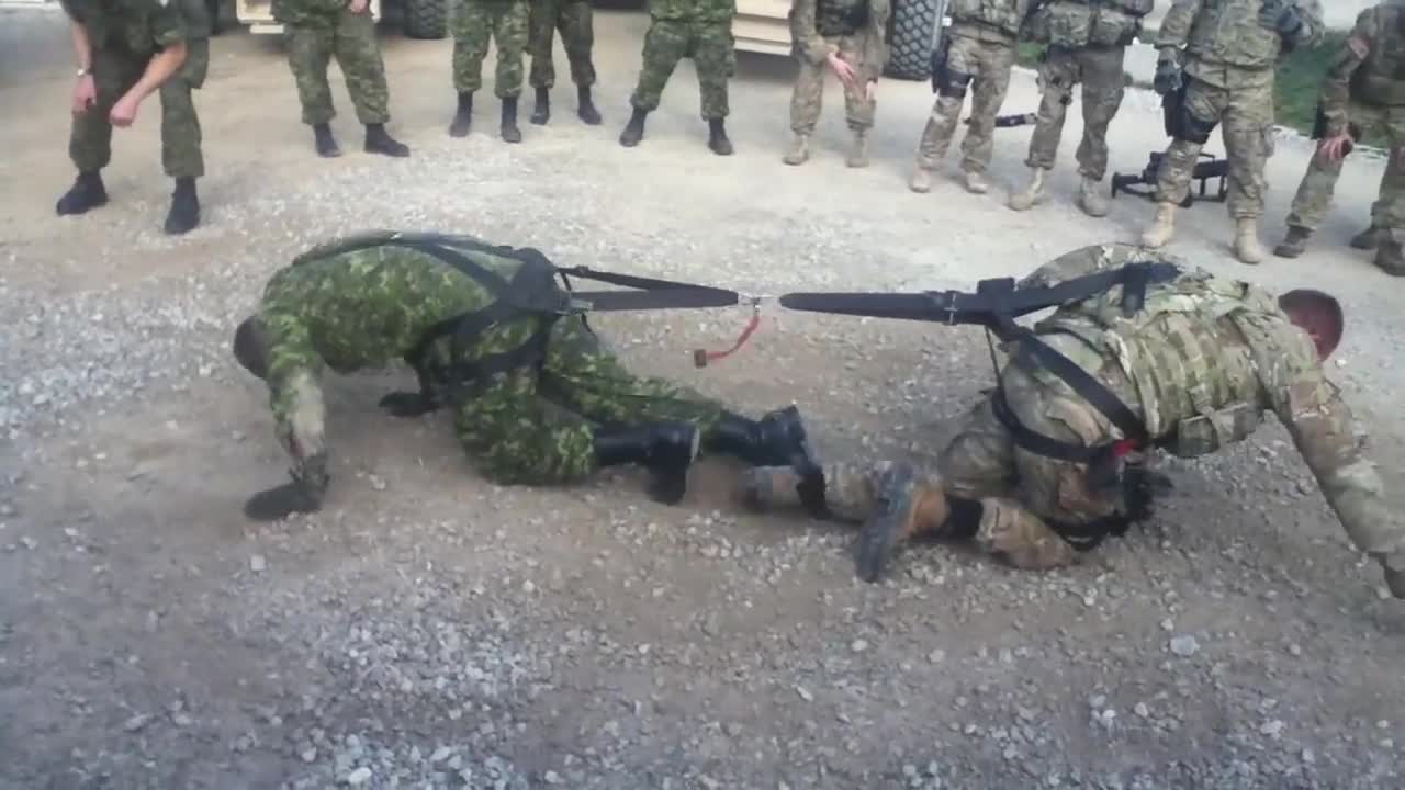 One on one soldier tug of war.