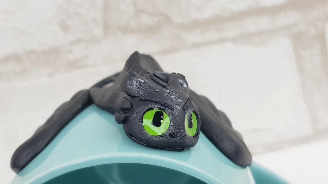 Polymer clay mug Toothless Viking. Gift How to train your dragon sit on a menthol cup by AnneAlArt.