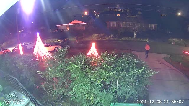 Driver Plows into Parked Car and Christmas Lights