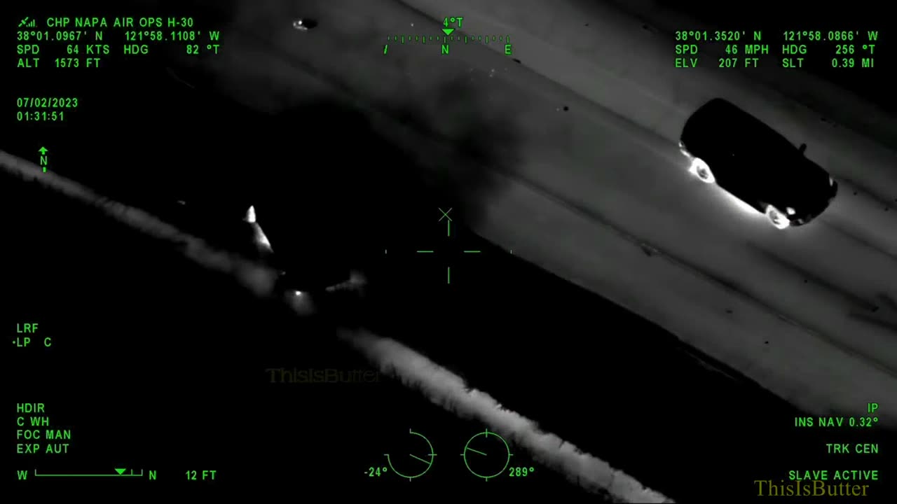 Sparks fly from suspect's car during police pursuit down highway in California