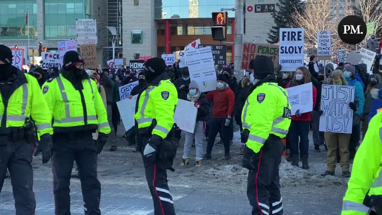 Counter protesters yell "Trans rights are human rights"