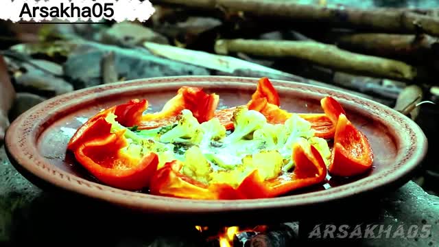 Making a delicious recipe for cauliflower with large peppers for food inspiration.