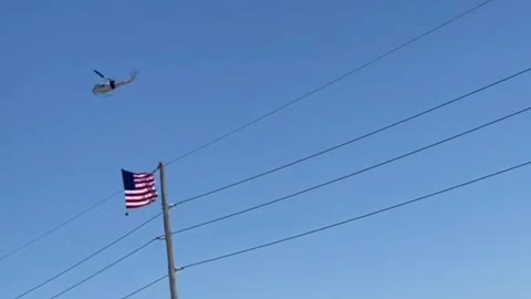 Freedom Convoy: Helicopter Flying with American Flag