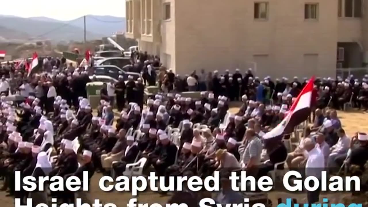 Golan Druze chant loyalty to Assad at Israel-Syria border