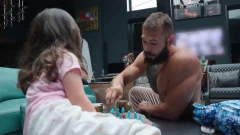 Andrew Tate with his daughter